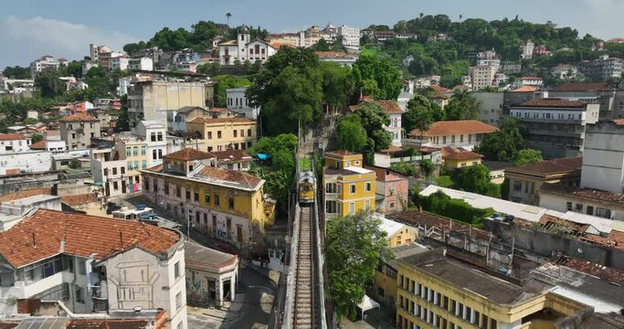 Follow the tram on the top of Carioca Aqueduct bridge heading towards Santa Teresa neighborhood in Rio de Janeiro 