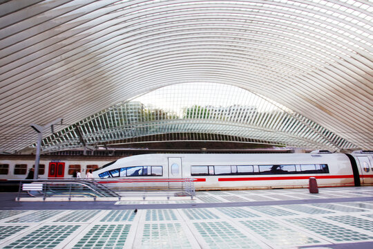 Speed train on   futuristic train station Liege