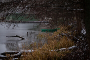 A gloomy and overcast winter day on the shore of Bernardine Lake. Trakai, Lithuania.