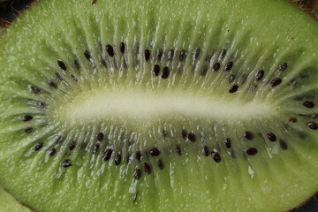 Kiwi is a crappy plan background of food. green food. Vitamin c actinidia seasonal fruits