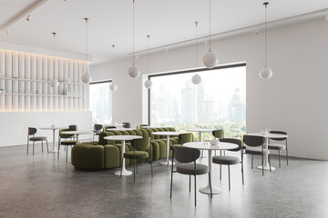 White cafeteria interior with eating zone with sofa, panoramic window