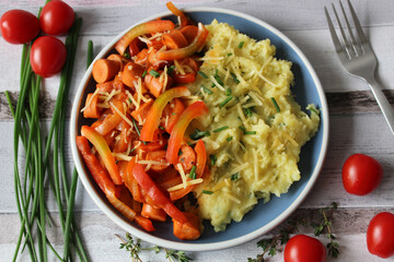 Comfort Fusion: Cheesy Mashed Potato Sausage Stew with Vibrant Bell Peppers, Tomatoes, and Fresh...
