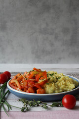 Comfort Fusion: Cheesy Mashed Potato Sausage Stew with Vibrant Bell Peppers, Tomatoes, and Fresh Thyme