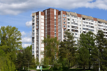 Urban residential building surrounded by trees in Zelenograd, Moscow, Russia