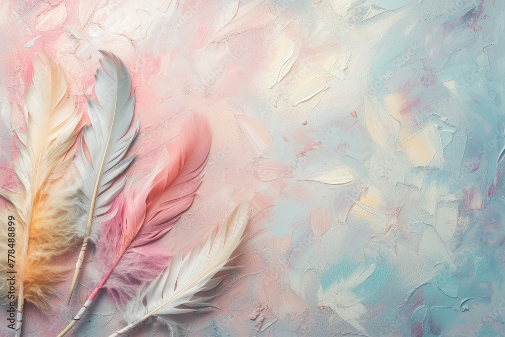 Aufkleber a high-angle shot displaying a variety of delicate feathers with soft pastel hues arranged over a te