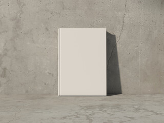 White Book Mockup front view with blank hard cover standing on white table near concrete wall. 3d rendering