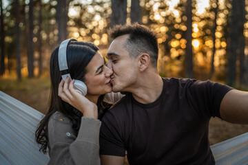 Man and woman young adult couple in nature self portrait selfie