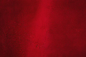Red suede as a background. Suede macro texture studio photo.
