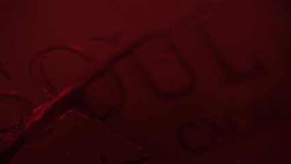 Cinematic envelope with a letter and an invitation to the ceremony, red light