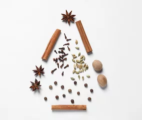 Fotobehang Christmas tree made of different spices on white table, flat lay © New Africa