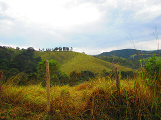 A beautiful landscape of mountains under mountains of a small country town