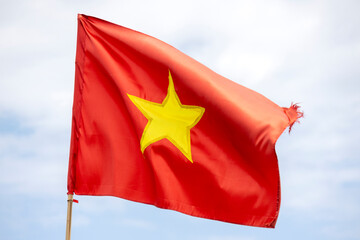 Flags of Vietnam on the pole with cloudy sky - 778571461