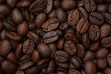 Selbstklebende Fototapeten coffee beans background © komthong wongsangiam