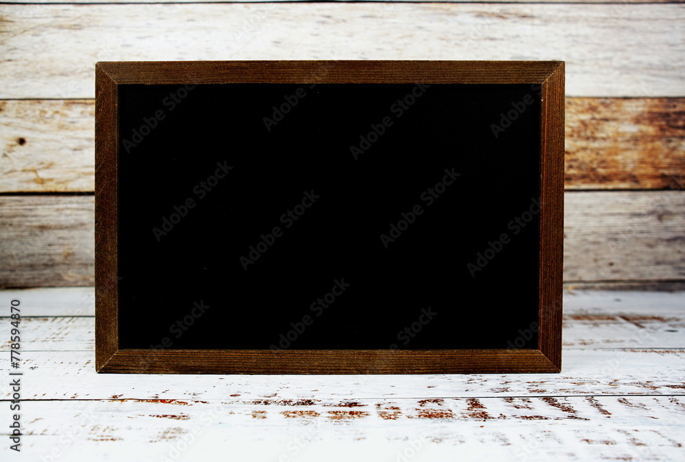 Poster empty chalkboard space for text message copy on wooden background