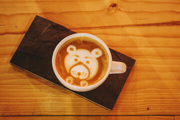 Coffee with latte art on a table
