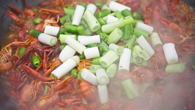 close up of cooking spicy crayfish in the pot