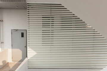 Stainless steel awning on the balcony of a modern business building