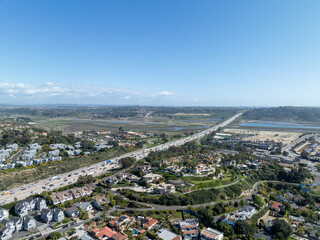 Aerial view of highway transportation with small traffic, highway interchange and junction, San Diego Freeway interstate 5, California