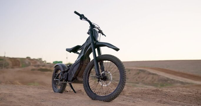Desert, electric bike and transportation with extreme sports, challenge and endurance with training and nature. Traveling, vehicle and outdoor with competition and eco friendly with sustainability