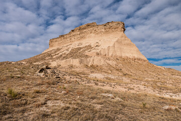 West Pawnee Butte in the Autumn Sun on the Great Plains.
The West Pawnee Butte rises 300 feet above the Pawnee National Grasslands in Northeastern Colorado. 