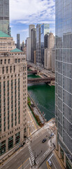Chicago Downtown. Cityscape image of Chicago, Ill. USA showing high rises, river, and river walk in the downtown district.

