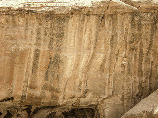 Stone carved inscription in Nabatean on one of the tombs of the Nabataean burial sites in the Petra Historic Reserve near the city of Wadi Musa which contains Petra in Jordan