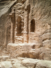Religious altars carved into the Al Siq gorge wall of Historical Reserve of Petra near the city of Wadi Musa which is home to Petra in Jordan