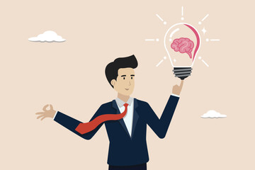 Brainstorming creative thinking and thinking idea concept, businessman gets brilliant light bulb idea for business success.