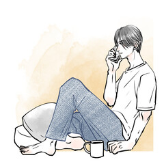 床に座ってスマホで話している男性
