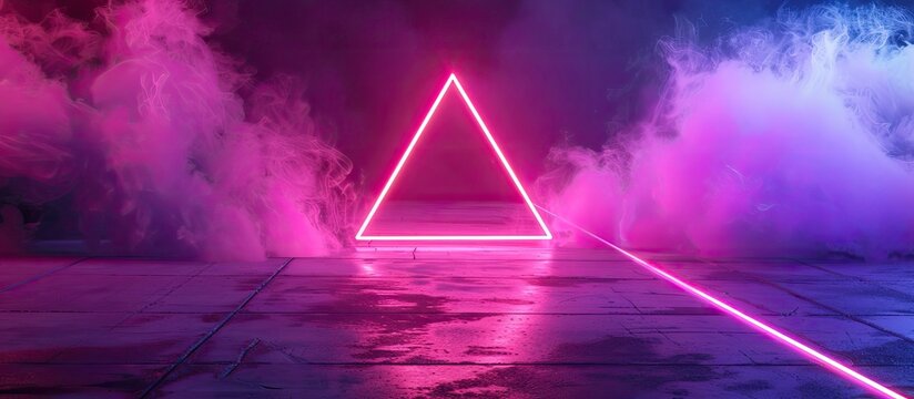 A neon triangle in electric blue color is encircled by smoke in a dark room, creating a mysterious and captivating atmosphere