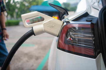 Power supply EV fuel Plug in hybrid car connect to electric vehicle for charge to the battery.