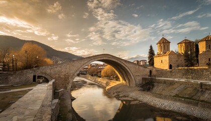 the ancient sacred bridge in gjakova kosovo in the evening hours - obrazy, fototapety, plakaty