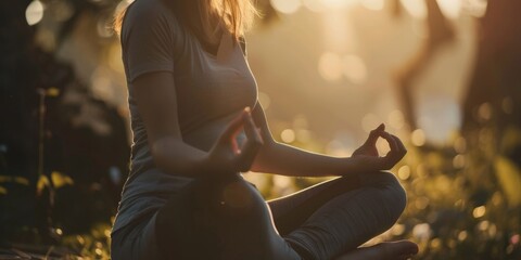 A woman wearing a white shirt is engaged in yoga poses in a serene outdoor setting - obrazy, fototapety, plakaty