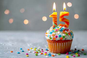 Birthday cupcake with number fifteen candle