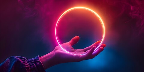 A hand emerges from the darkness holding a glowing neon circle that radiates a mesmerizing otherworldly light - obrazy, fototapety, plakaty