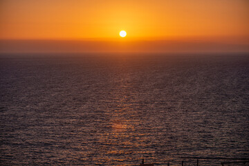 sunset over the ocean - 778663087