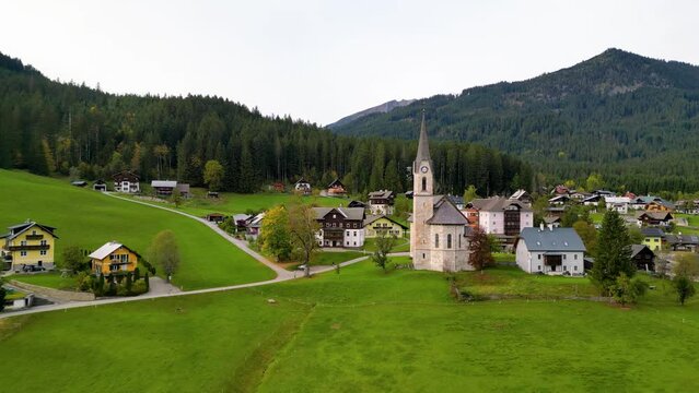 Aerial view of historic church in scenic Gosau village in Austria.