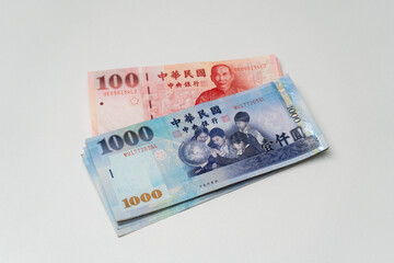 Taiwanese dollar banknote on white background - 778693258