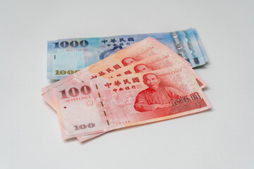Taiwanese dollar banknote on white background