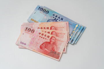 Taiwanese dollar banknote on white background - 778693483
