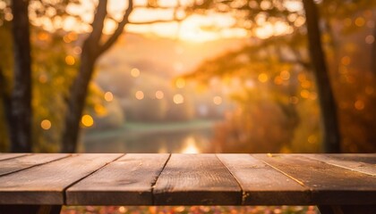 wooden table and blurred bokeh autumn background - obrazy, fototapety, plakaty