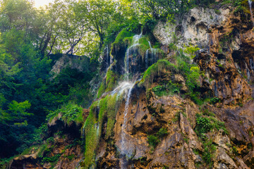 Naklejka na ściany i meble Beautiful landscape in the Plitvice Lakes National Park in Croatia. Natural Waterfalls. Natural wonders