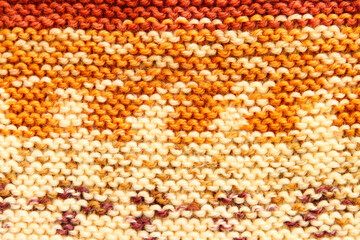 background of beige and brown knitting texture made of wool - 778706824