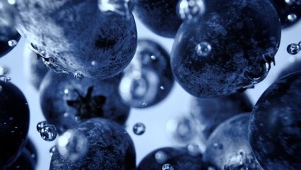 Super Slow Motion Shot of Fresh Blueberries Falling into Water and Creating Bubbles at 1000fps. - Powered by Adobe