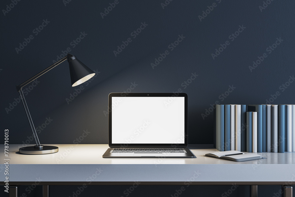 Aufkleber modern concrete workplace with lamp, books and white mock up laptop. workspace close up. 3d renderin
