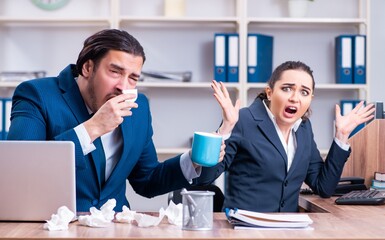 Two employees suffering at workplace