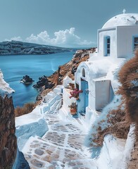 A picturesque view of a traditional white building with a blue dome overlooking the Aegean Sea in Santorini, Greece. 