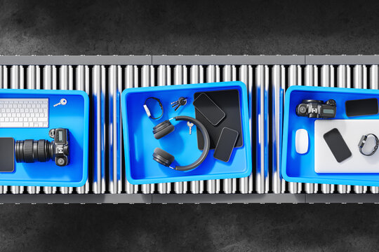 Boxes with electronics and personal items at airport security check