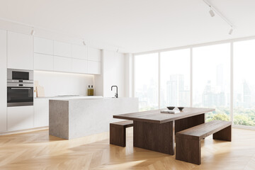 Cozy home kitchen interior with bar island, eating table and panoramic window - obrazy, fototapety, plakaty