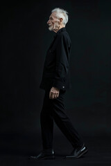 Timeless Elegance: Senior Gentleman in Classic Black Suit - Banner